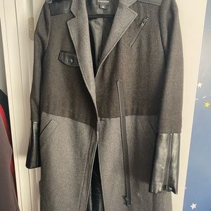 Black and grey coat with leather accents.